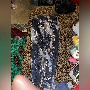 Metallic black, gold, and white pants from shein